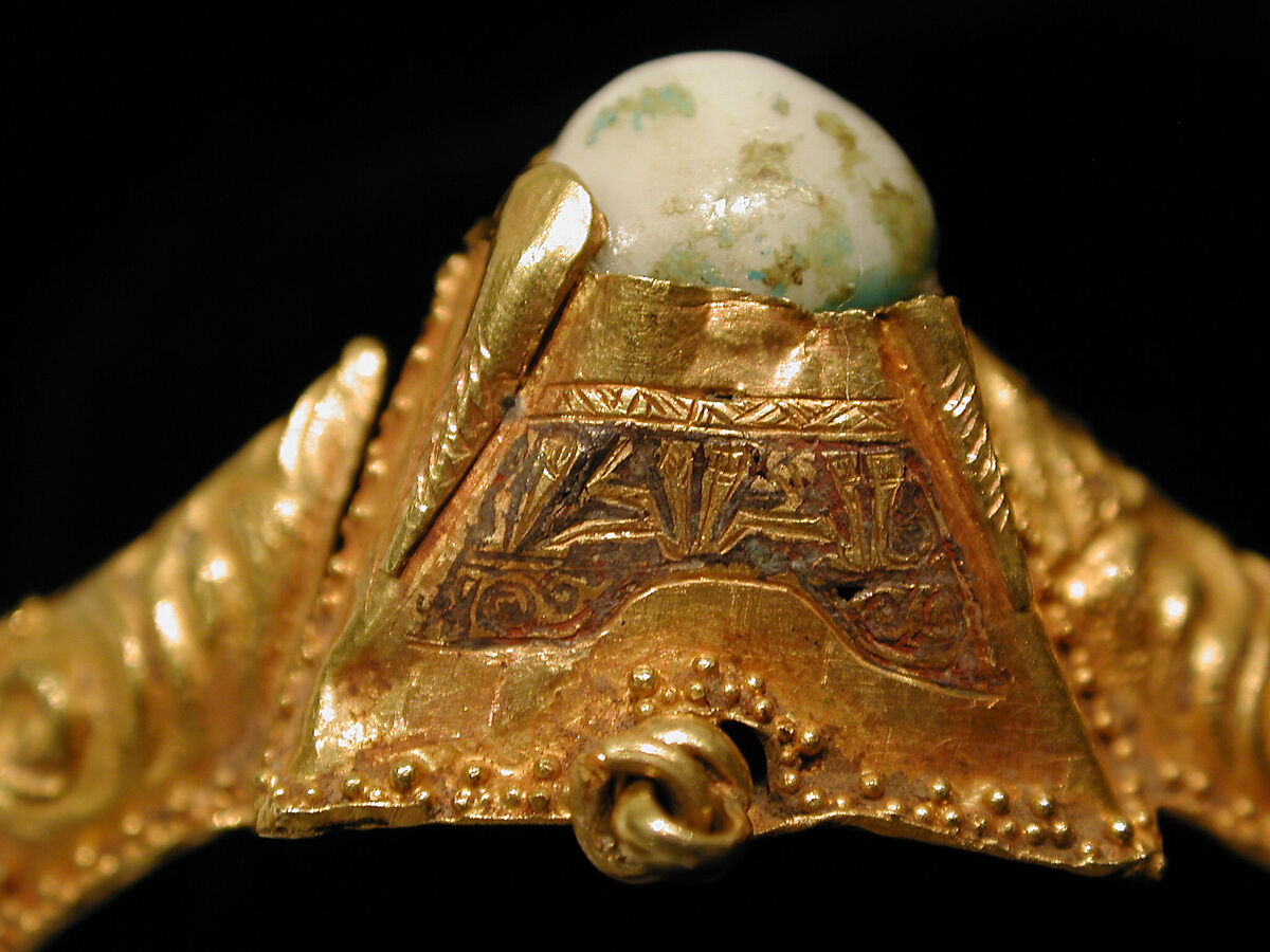 Bracelet, Gold, fabricated from sheet, decorated with bitumen-highlighted incising, granulation, and repoussé, set with glazed quartz, ruby, garnet, and, originally, two other stones