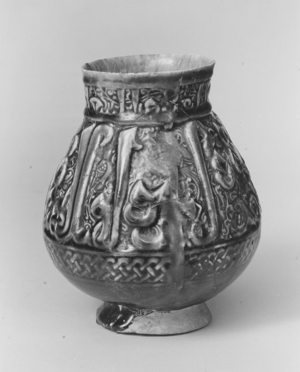 Ewer, Earthenware; molded decoration under dark blue glaze