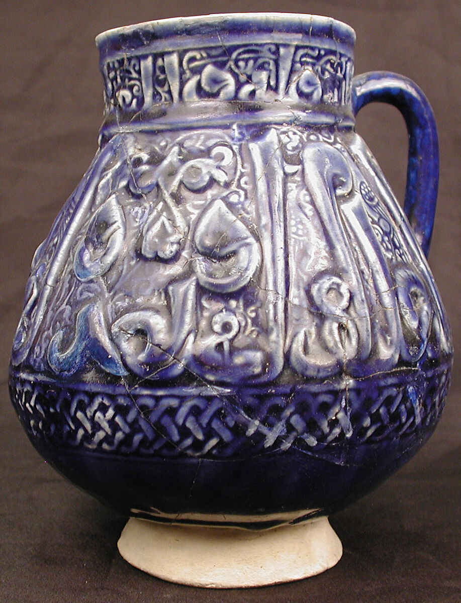 Ewer, Earthenware; molded decoration under dark blue glaze