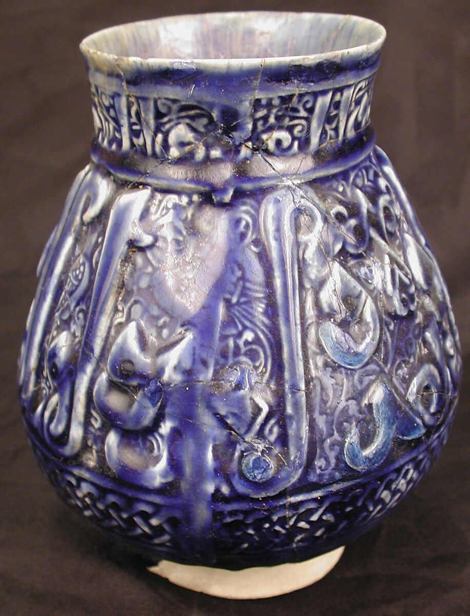 Ewer, Earthenware; molded decoration under dark blue glaze