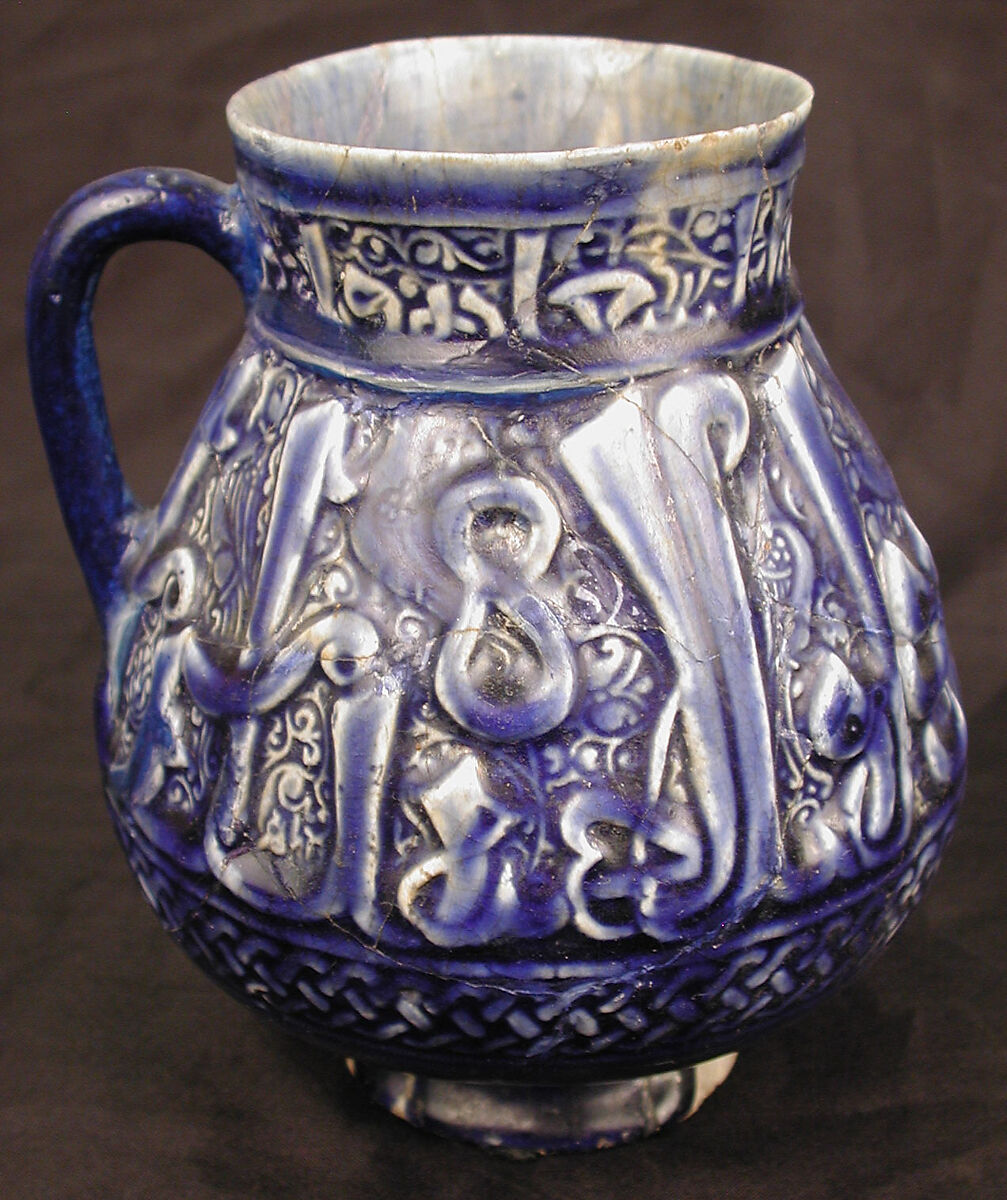 Ewer, Earthenware; molded decoration under dark blue glaze 