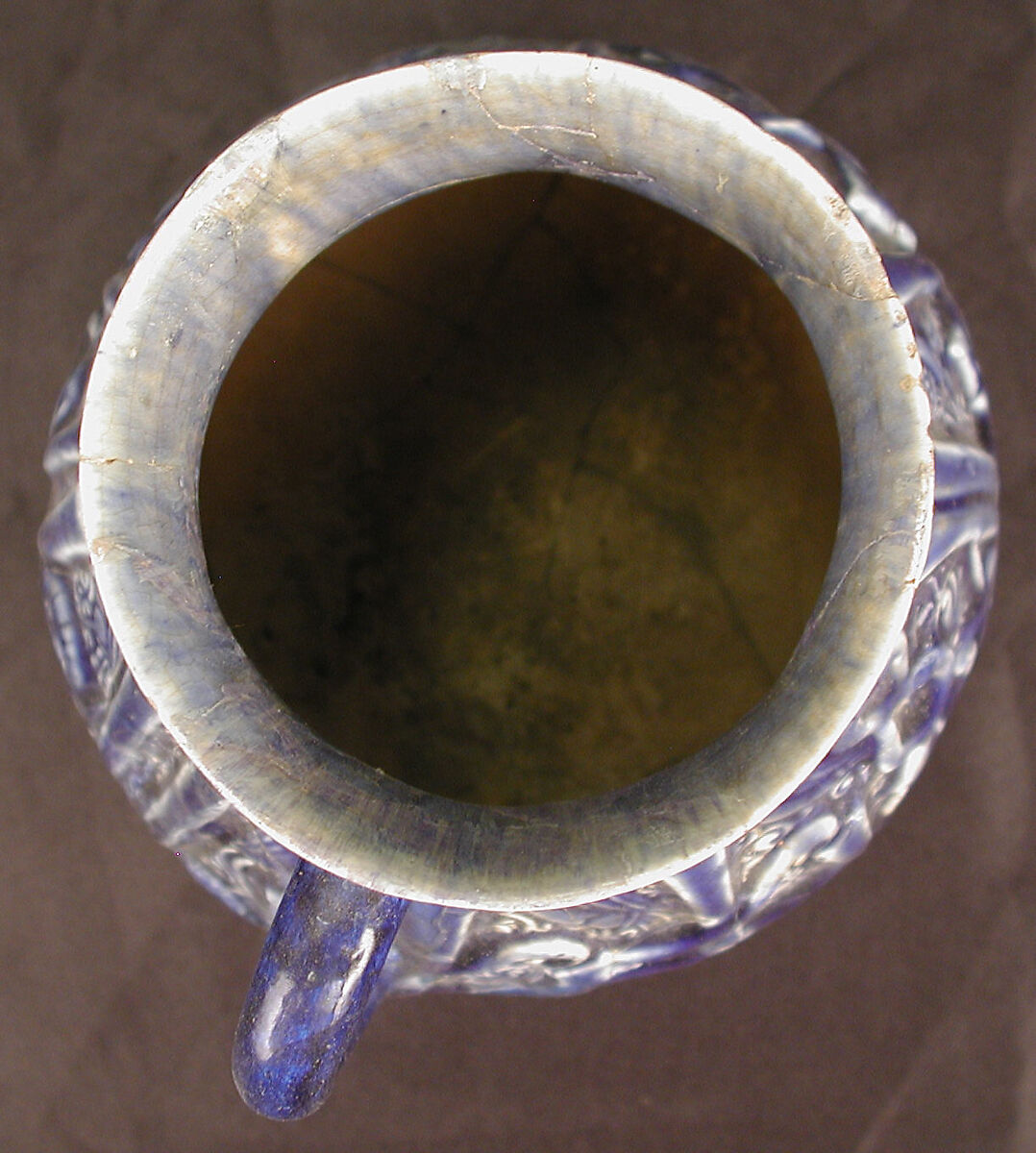 Ewer, Earthenware; molded decoration under dark blue glaze