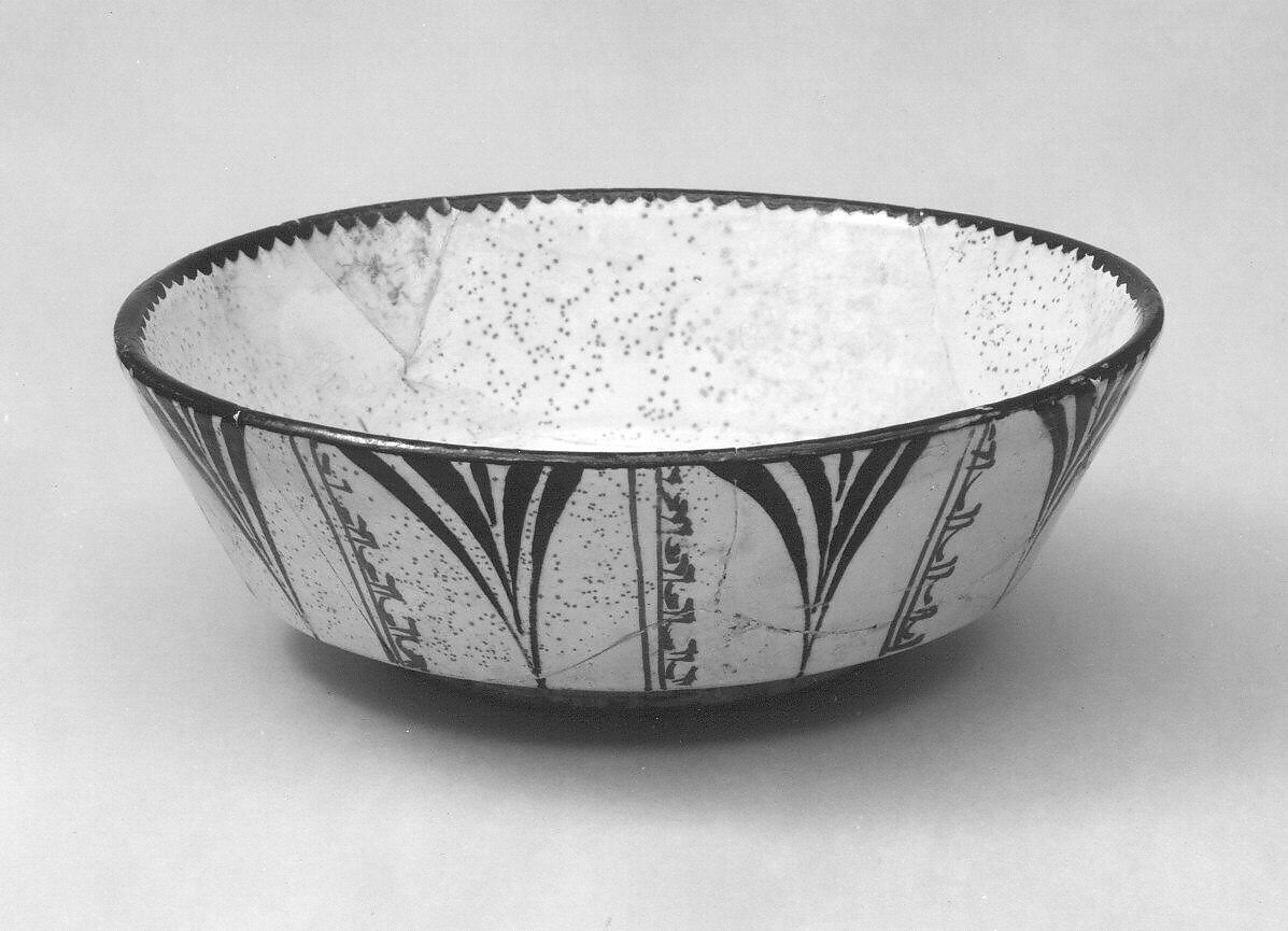 Bowl with Rosette, Earthenware; white slip with polychrome slip decoration under transparent glaze