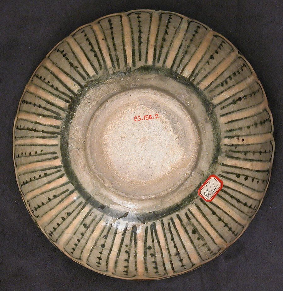 Bowl, Earthenware; underglaze painted on cream slip, transparent glaze