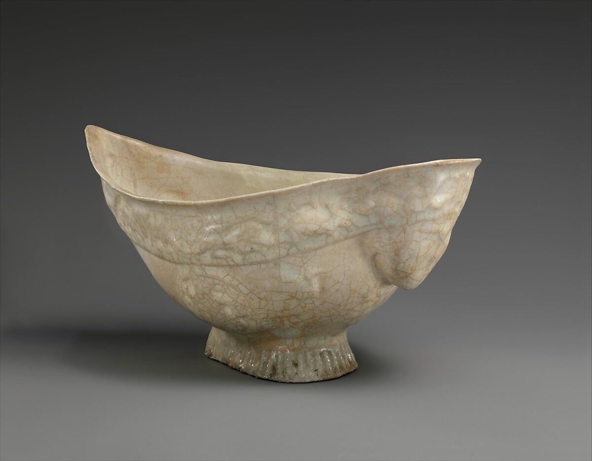 Boat-Shaped Bowl with Human Head and Animals, Stonepaste; molded, opaque white glaze