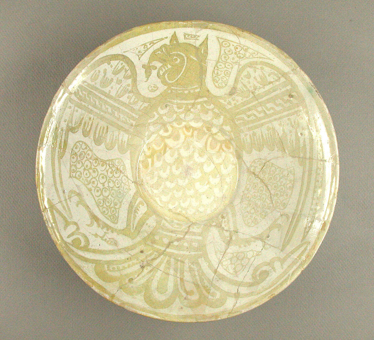 Bowl with Eagle, Muslim Ibn al-Dahhan (Egyptian), Earthenware; luster-painted on opaque white glaze