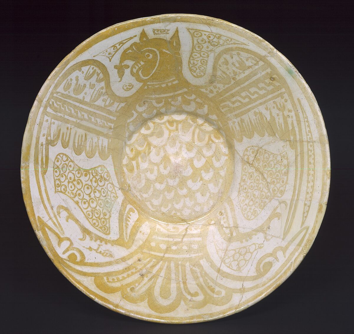 Bowl with Eagle, Muslim Ibn al-Dahhan (Egyptian), Earthenware; luster-painted on opaque white glaze
