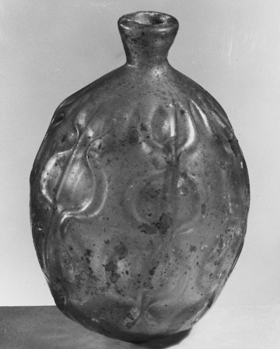 Bottle, Glass, greenish; mold blown, tooled, and free blown