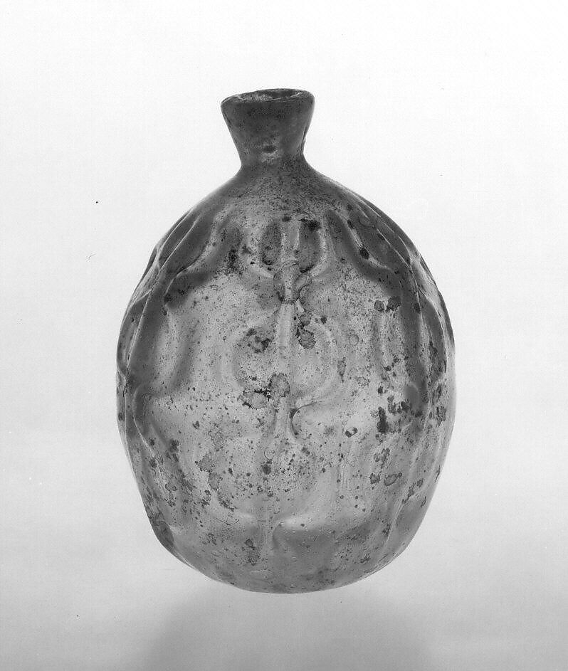 Bottle, Glass, greenish; mold blown, tooled, and free blown