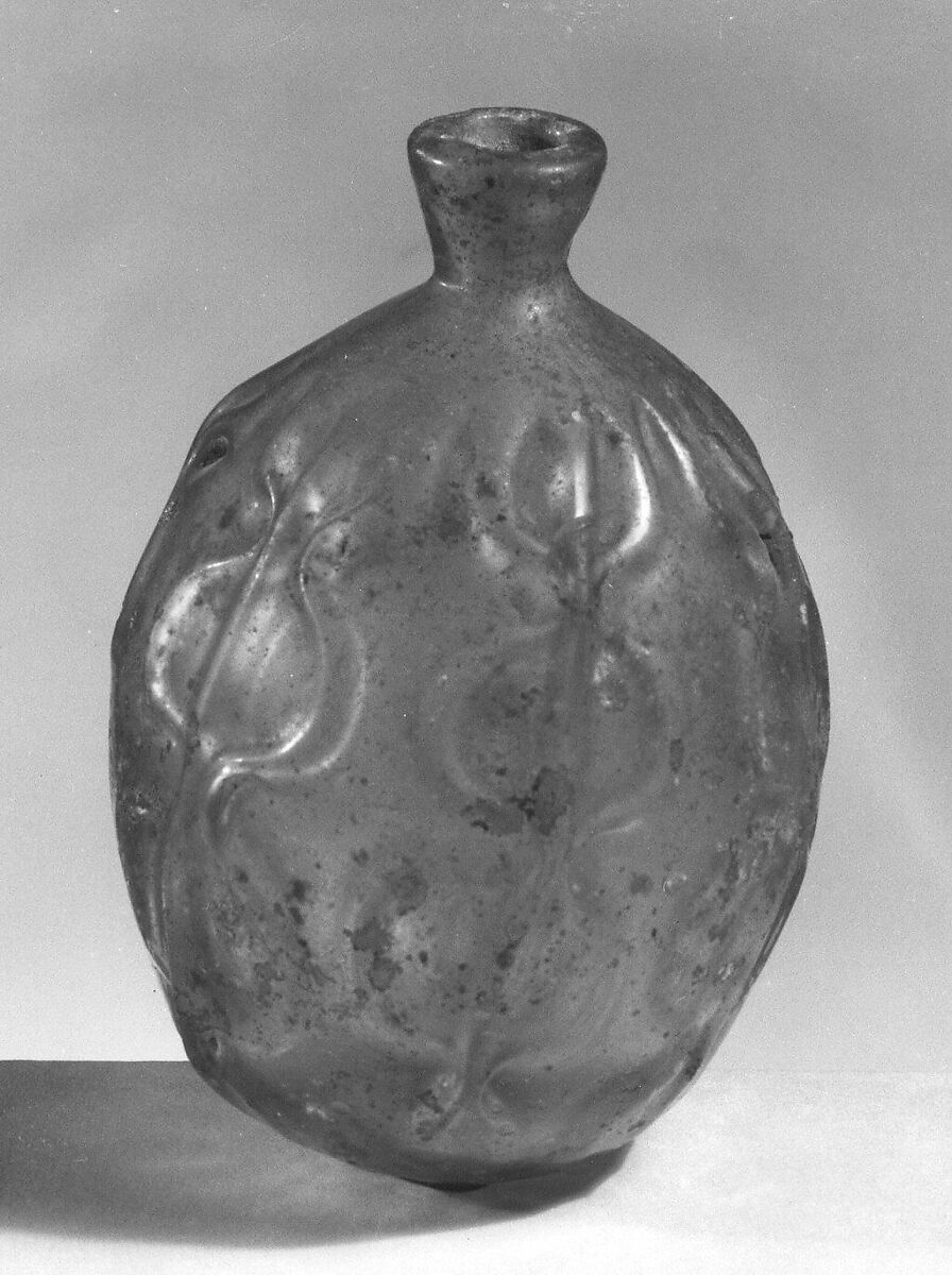 Bottle, Glass, greenish; mold blown, tooled, and free blown