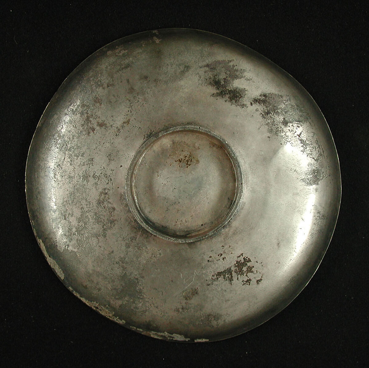 Plate Depicting a Female Figure Riding a Fantastic Winged Beast, Silver; gilded, chased, and engraved, with applied elements