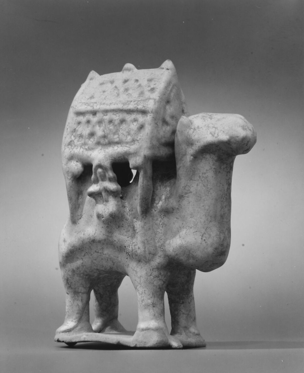 Figurine in the Form of a Camel Carrying a Palanquin and Two Riders, Stonepaste; molded in sections, glazed in turquoise