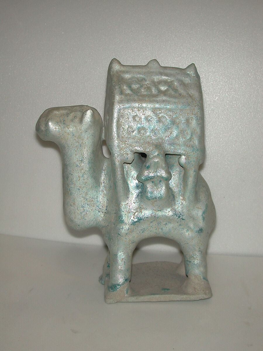 Figurine in the Form of a Camel Carrying a Palanquin and Two Riders, Stonepaste; molded in sections, glazed in turquoise