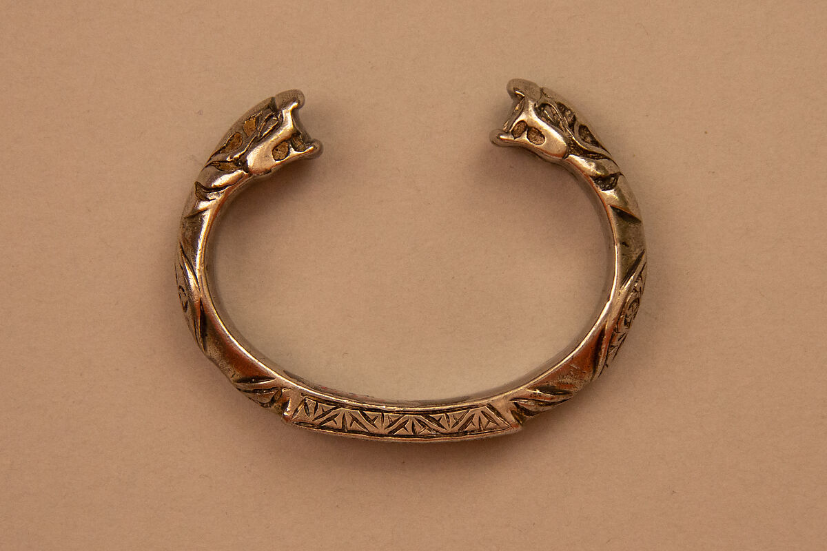 Bracelet with Snake-Head Endings and Arabic Inscription, One of a Pair, Silver; cast and chased