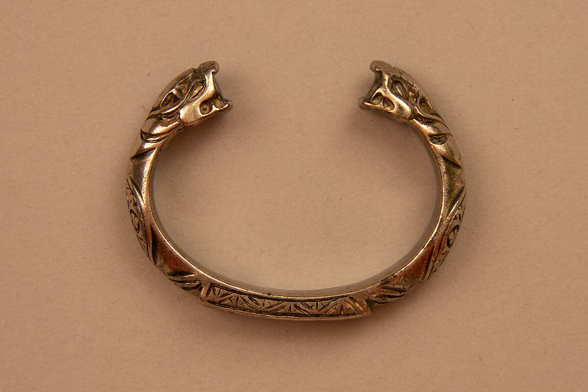 Bracelet with Snake-Head Endings and Arabic Inscription, One of a Pair, Silver; cast and chased