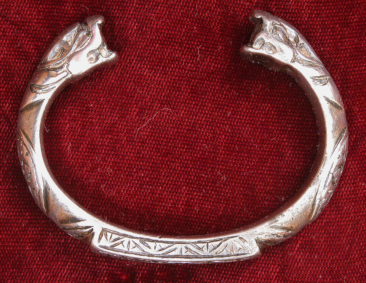 Bracelet with Snake-Head Endings and Arabic Inscription, One of a Pair, Silver; cast and chased 
