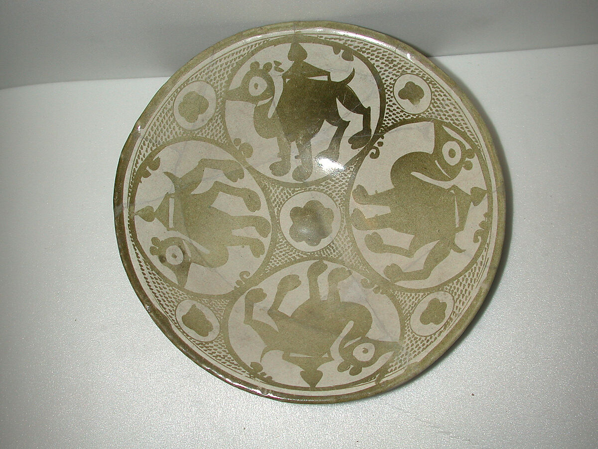 Luster Bowl with Four Camels, Earthenware; luster-painted on opaque white glaze
