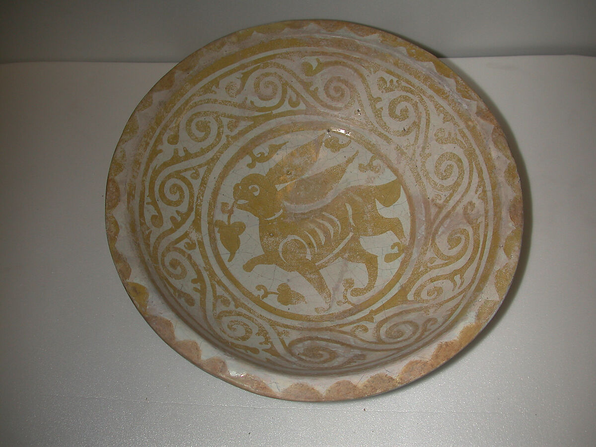 Bowl Depicting a Running Hare, Earthenware; luster-painted on opaque white glaze