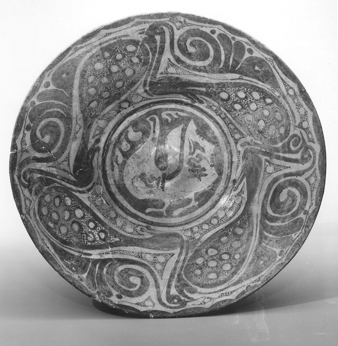 Bowl, Earthenware; white slip, slip decoration in green luster