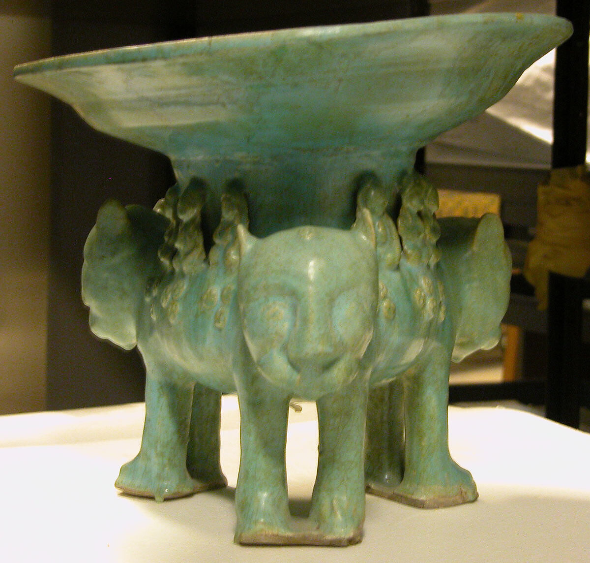 Bowl on a Base of Three Molded Lions, Stonepaste; molded in sections, monochrome glazed 