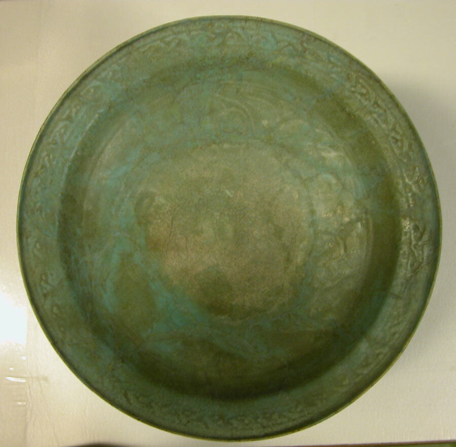 Bowl on a Base of Three Molded Lions, Stonepaste; molded in sections, monochrome glazed