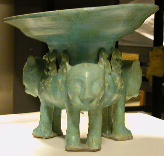 Bowl on a Base of Three Molded Lions