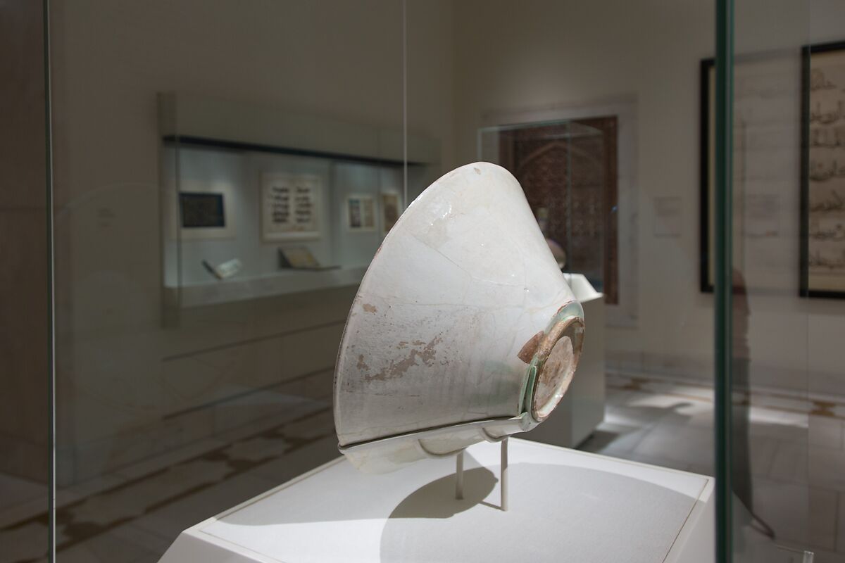 Bowl with Arabic Inscription, Earthenware; white slip with black-slip decoration under transparent glaze