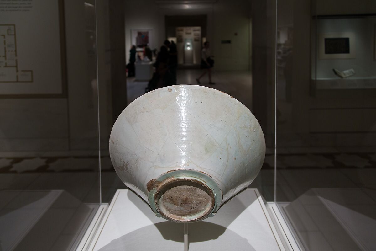 Bowl with Arabic Inscription, Earthenware; white slip with black-slip decoration under transparent glaze