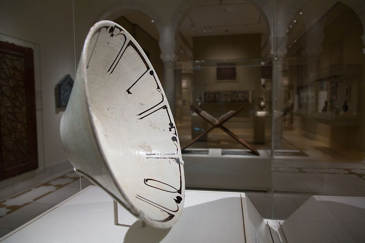 Bowl with Arabic Inscription, Earthenware; white slip with black-slip decoration under transparent glaze