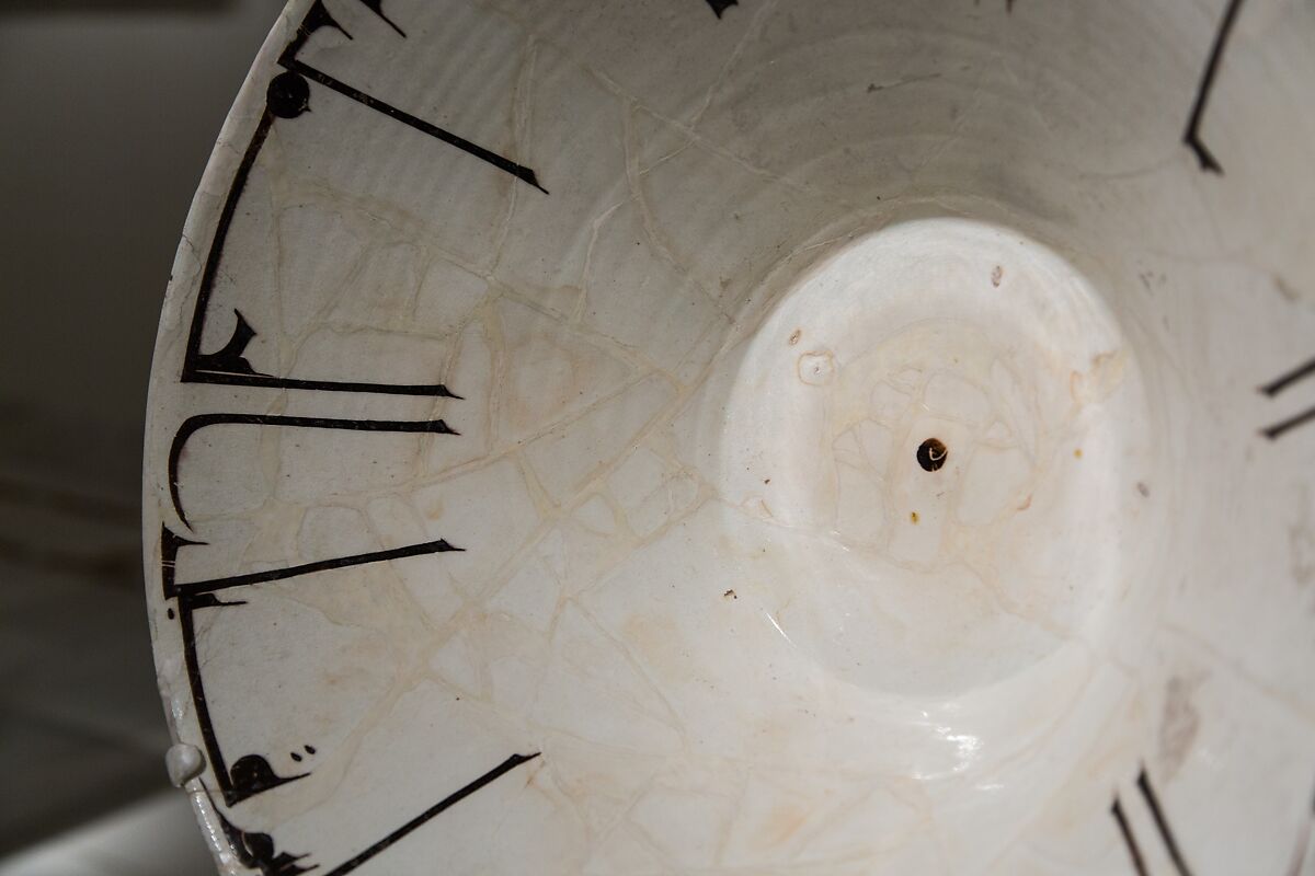 Bowl with Arabic Inscription, Earthenware; white slip with black-slip decoration under transparent glaze