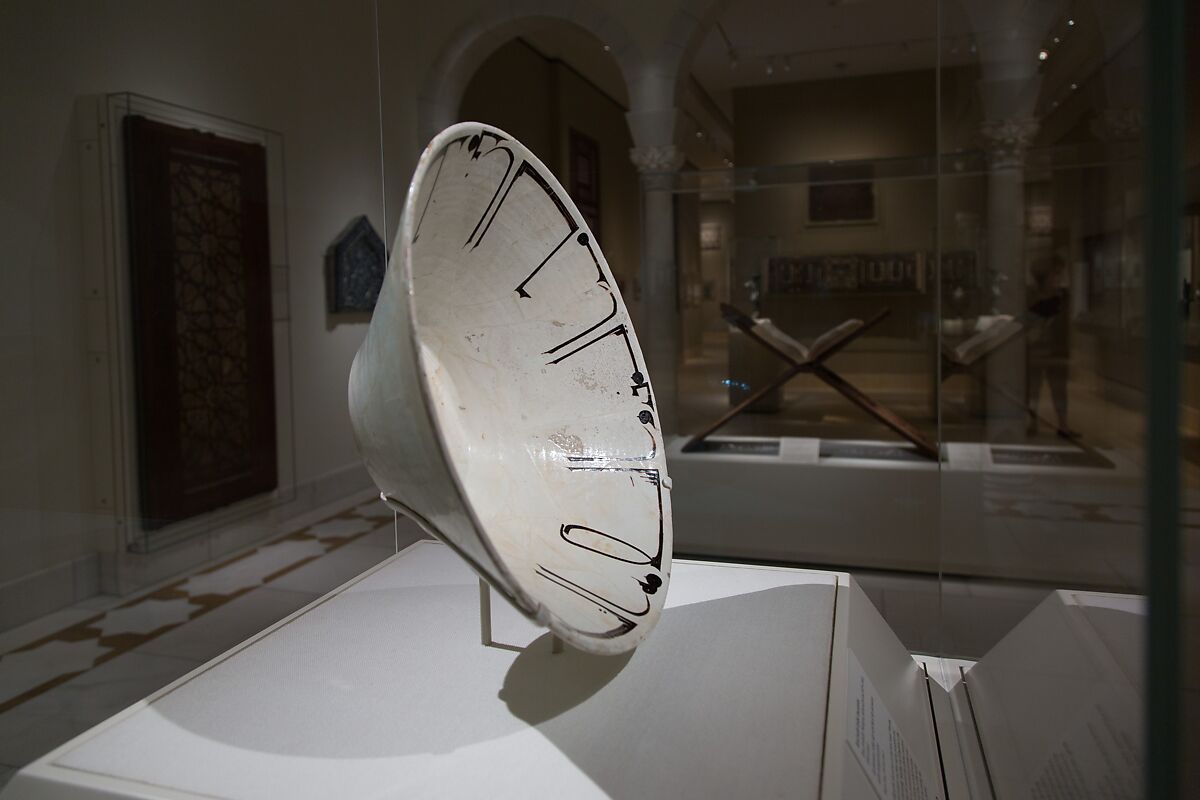 Bowl with Arabic Inscription, Earthenware; white slip with black-slip decoration under transparent glaze