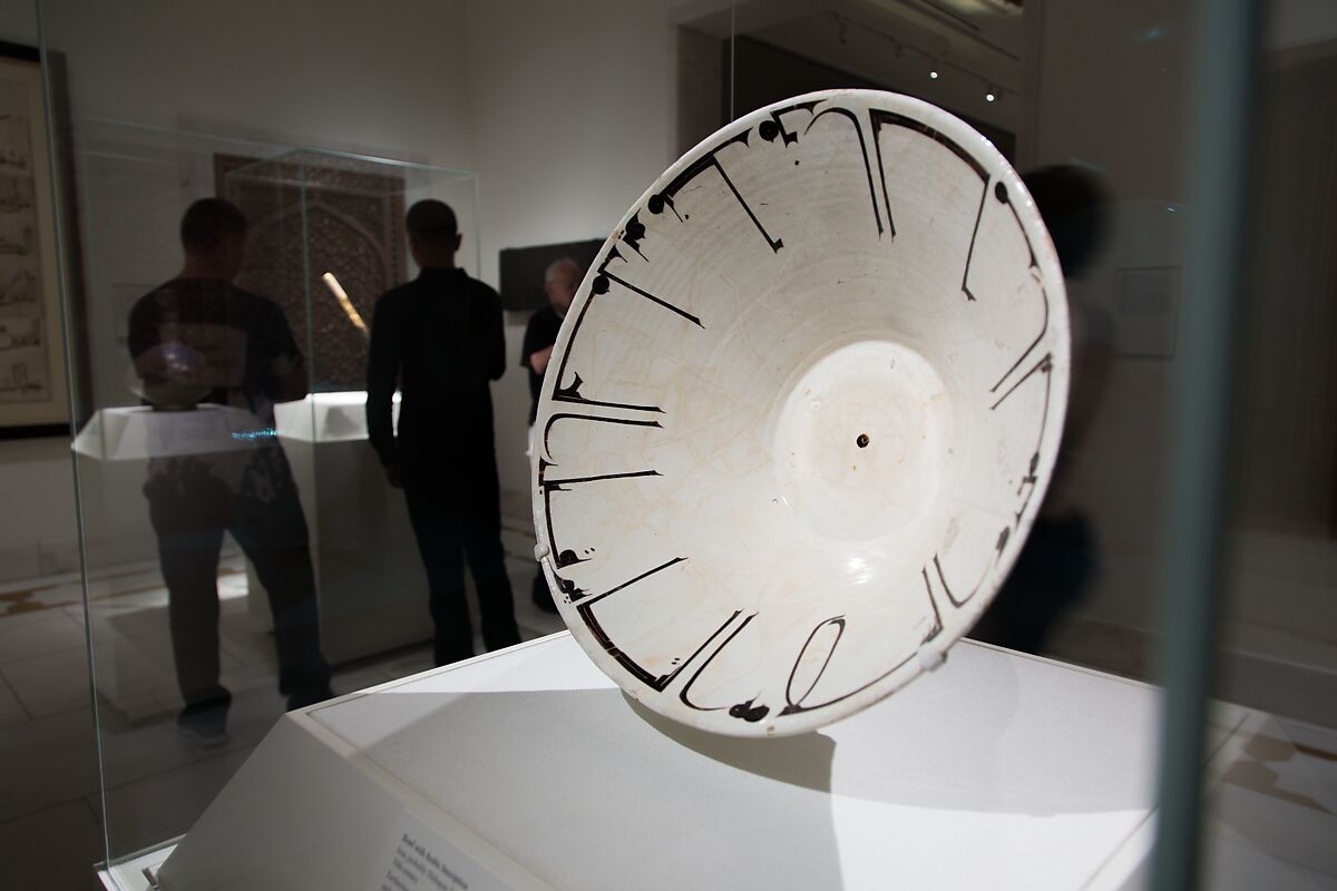Bowl with Arabic Inscription, Earthenware; white slip with black-slip decoration under transparent glaze