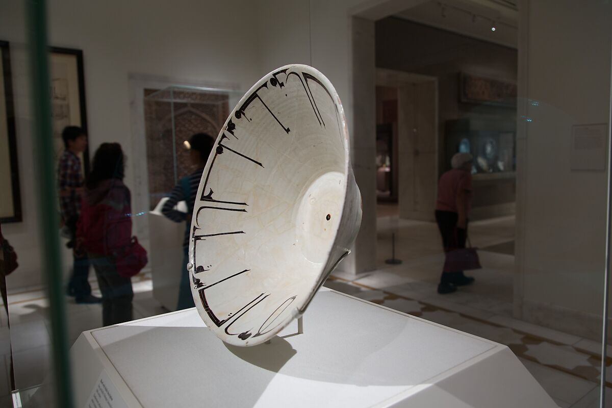 Bowl with Arabic Inscription, Earthenware; white slip with black-slip decoration under transparent glaze