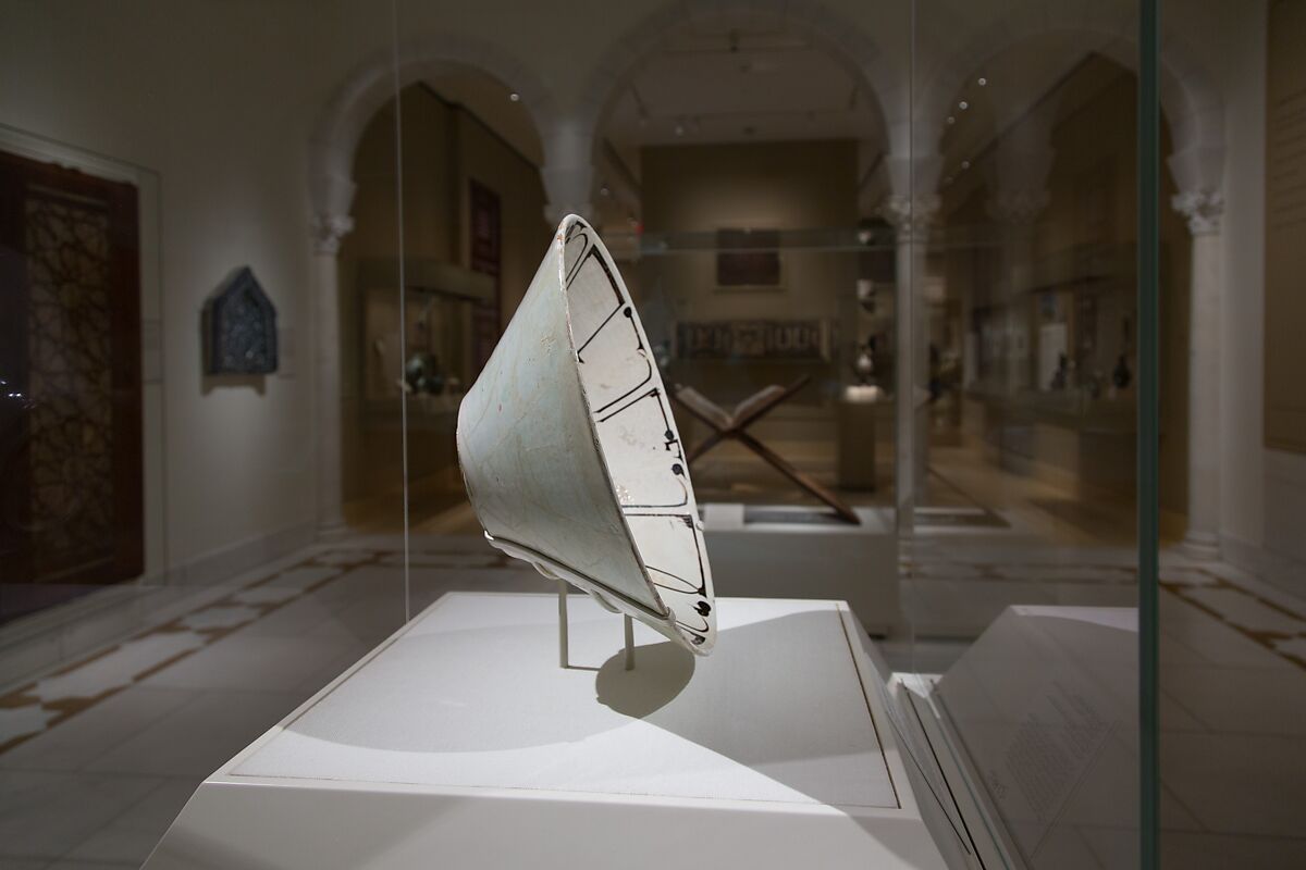 Bowl with Arabic Inscription, Earthenware; white slip with black-slip decoration under transparent glaze