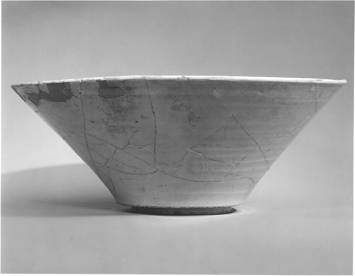 Bowl with Arabic Inscription, Earthenware; white slip with black-slip decoration under transparent glaze