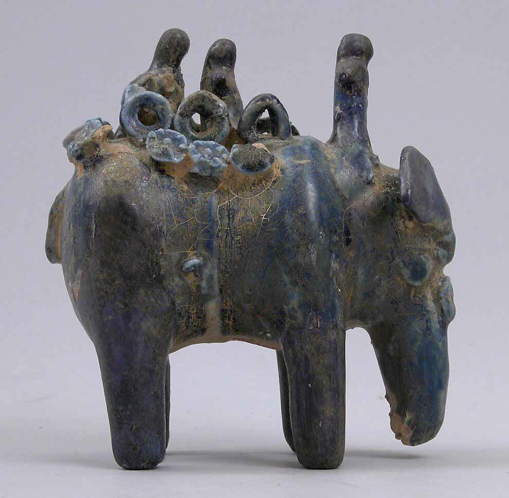 Elephant Carrying Two Figures Seated on Hawda and Mahout Seated on Neck, Stonepaste; molded, transparent blue glaze