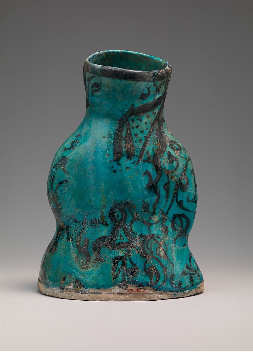 Molded Vessel in the Form of a Mother and Child, Stonepaste; molded, painted under transparent turquoise glaze