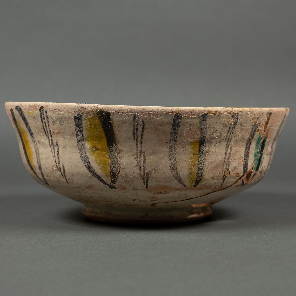 Bowl, Earthenware; buff body, brown slip decoration, splashed polychrome glaze