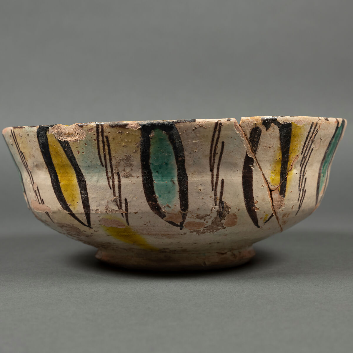 Bowl, Earthenware; buff body, brown slip decoration, splashed polychrome glaze