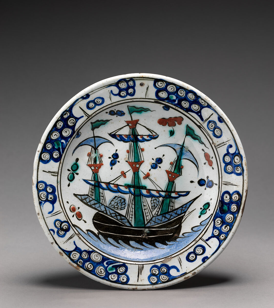 Dish with Sailing-Ship Design, Stonepaste; polychrome painted under transparent glaze 