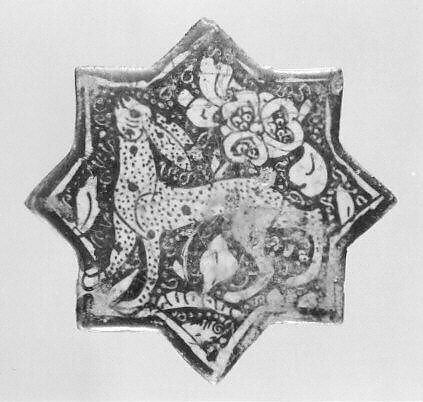 Star-Shaped Tile, Stonepaste; luster-painted over transparent colorless glaze