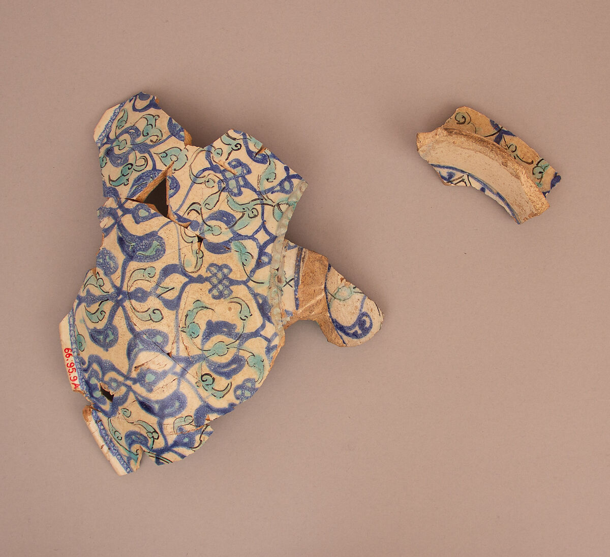 Fragments of a Dish, Stonepaste; polychrome inglaze and overglaze painted on opaque white glaze, molded (mina'i)