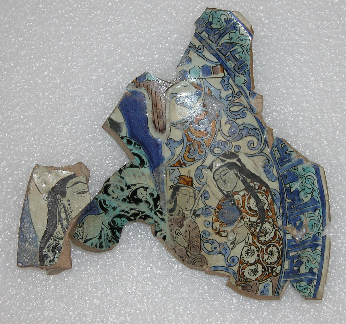 Fragments of a Dish, Stonepaste; polychrome inglaze and overglaze painted on opaque white glaze, molded (mina'i)