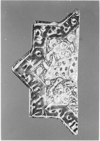 Star-Shaped Tile Fragment, Stonepaste; luster-painted