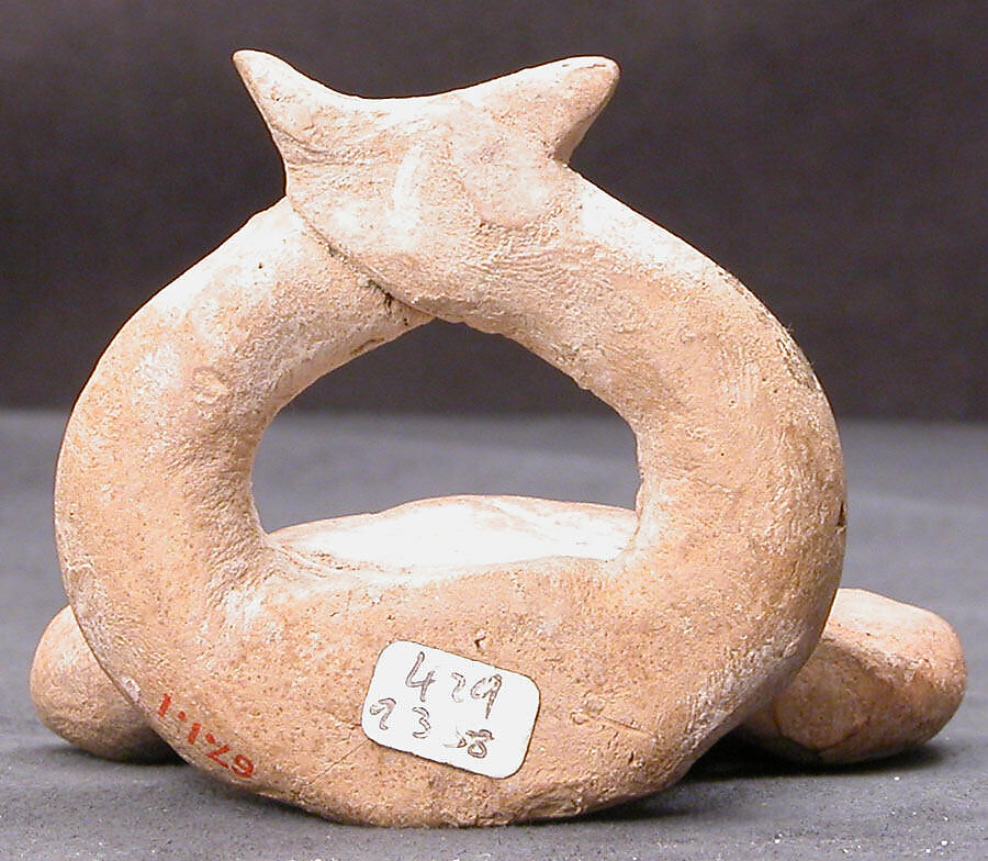 Figurine of a Seated Personage with Folded Arms and Elaborate Headdress, Earthenware; unglazed