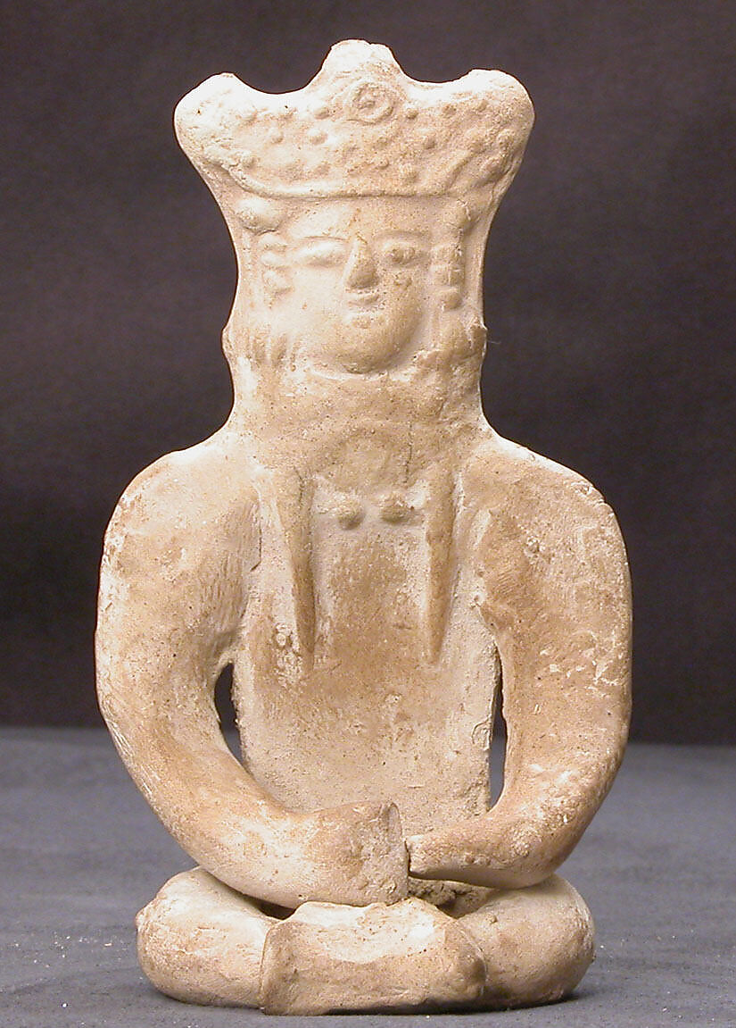 Figurine of a Female (?) Seated Personage with Elaborate Headdress, Earthenware; unglazed 