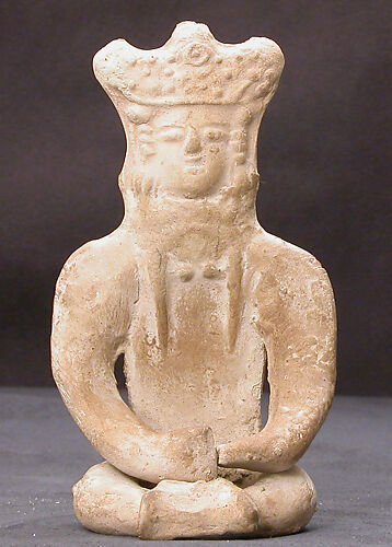 Figurine of a Female (?) Seated Personage with Elaborate Headdress 
