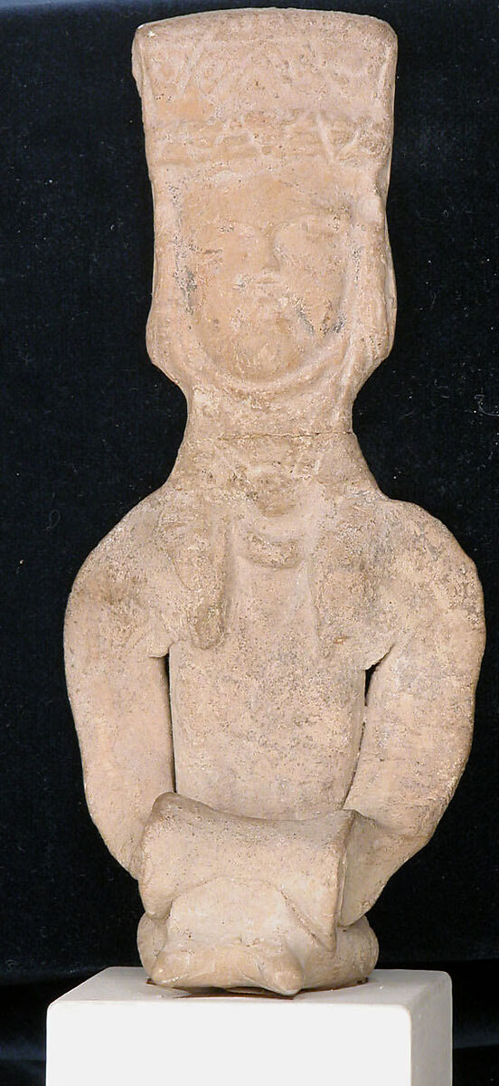 Figurine of a Seated Drum Player, Earthenware; unglazed 