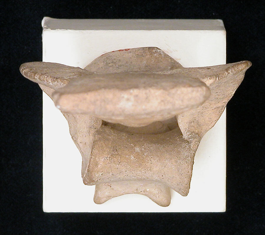 Figurine of a Seated Drum Player, Earthenware; unglazed