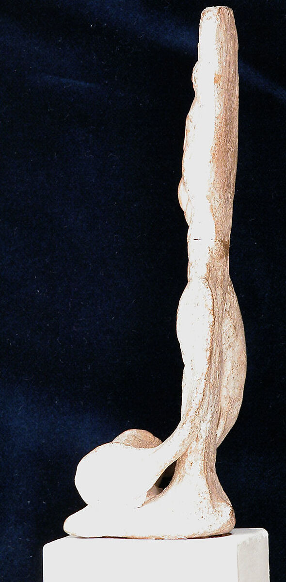 Figurine of a Seated Drum Player, Earthenware; unglazed